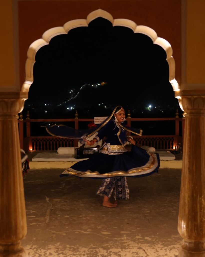 City Palace in Jaipur, showcasing grand courtyards, ornate arches, and a blend of Rajput and Mughal architectural details
