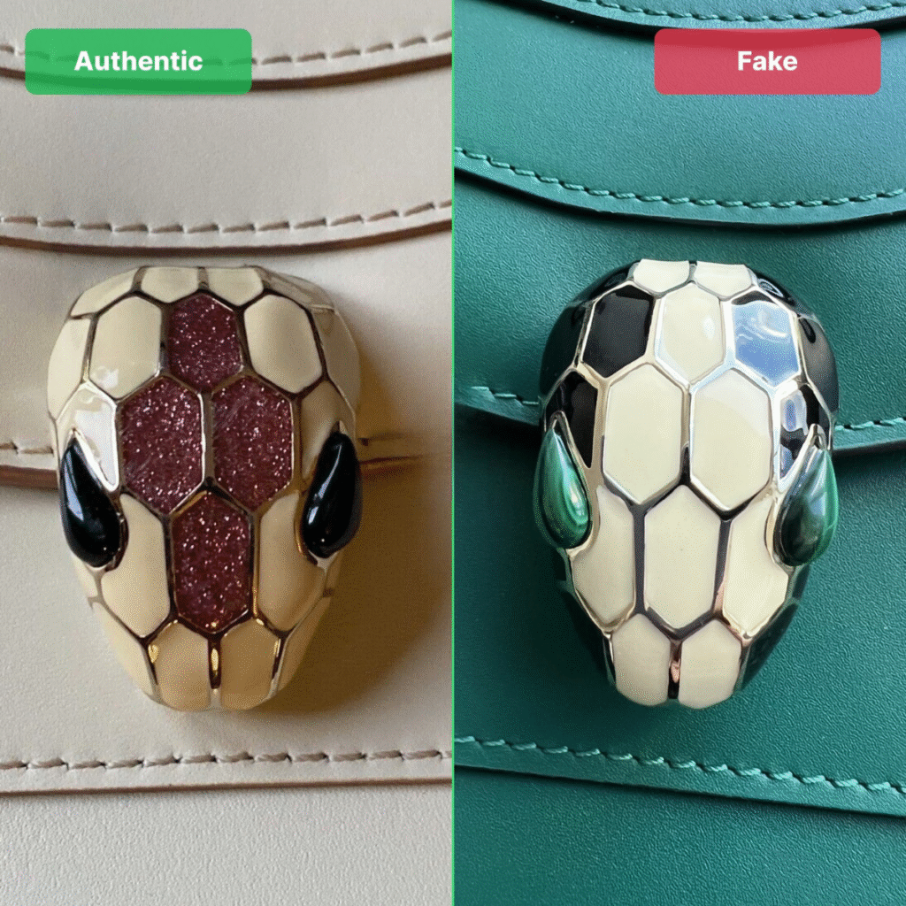 Close-up of Bvlgari Serpenti bag snakehead clasp showing enamel detailing and gemstone eyes, authentic luxury handbag